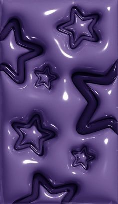 an abstract purple background with stars in the middle and one star on the left side