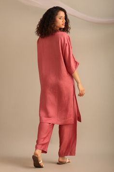 Rose linen satin kurta with floral and thread hand embroidered yoke and one-side sleeve. Comes with pant. - Aza Fashions Pink Raw Silk Sets For Spring, Summer Raw Silk Straight Kurta Set, Raw Silk Straight Kurta Set For Summer, Summer Raw Silk Set With Straight Kurta, Satin Kurta, Pink Linen, Pant Set, Set For Women, Aza Fashion