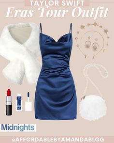 a blue dress with white fur and accessories