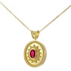 Adorn yourself with our gleaming oval gold pendant, showcasing a captivating oval deep red ruby encircled by a symphony of meticulously crafted granulations, A symbol of timeless elegance and enduring allure. 100% handmade in our workshop. Metal: 14K Gold| 18K Gold Gemstones: Oval Ruby | weight 0,39 ct Discover the art of personalization as you select your dream jewelry, choosing the perfect gemstone that resonates with your unique style.  Our dedicated team is always ready to assist, ensuring a Byzantine Oval Gemstone Jewelry, Byzantine Style Oval Gemstone Jewelry, Yellow Gold Ruby Oval Pendant, Yellow Gold Ruby Oval Pendant Jewelry, Gold Oval Ruby Necklace, Ruby Oval Pendant In Yellow Gold, Yellow Gold Oval Byzantine Jewelry, Oval Ruby Gold Necklace, Oval Ruby Jewelry With Engraving