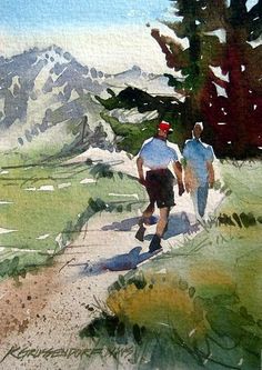 two people walking down a trail in the mountains