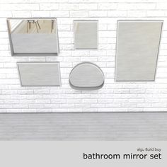 the bathroom mirror set is in front of a white brick wall with three mirrors on it