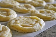 freshly baked cookies are lined up on a baking sheet