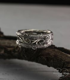 Womens vintage style tree band, Womens unique tree wedding ring, Vine wedding band, Womens tree ring, Wide silver ring, Silver band. ■ All wedding rings are only crafted with the finest of recycled metals DETAILS: Metal - Sterling Silver Dimensions - width 9mm (0.35 in.), Thickness - 1,5mm (0.059 in.) Finish - shiny and oxidized Please choose your ring size and finish in menu while making your order View all tree bands and rings: http://etsy.me/2v9a68V ■ CUSTOM OPTIONS - SIZES AVAILABLE: This ri Unique Antique Silver Wedding Jewelry, Unique Carved Engraved Ring For Promise, Unique Carved Engraved Promise Ring, Sterling Silver Engraved Ring With Carved Details For Wedding, Vintage Hand Forged Engraved Ring For Wedding, Nature-inspired Engraved Wedding Rings, Rustic Silver Jewelry For Anniversary, Antique Silver Wedding Ring Jewelry, Handmade Antique Silver Wedding Ring