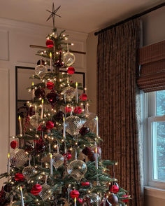 Embrace tradition with green and red Christmas tree decor, featuring timeless ornaments, festive ribbons, and a cozy holiday charm. Classic Red Christmas, Satin Ornaments, Tall Christmas Trees, Fiber Optic Christmas Tree, Tapered Candles, Artificial Christmas Wreaths, Christmas Front Porch, Glass Tree, Christmas Clearance