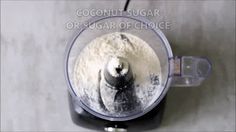 an overhead view of a food processor with flour in it and the words coconut sugar or sugar of choice