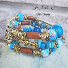 Floral Bead Boho Style Wire Wrap Bracelet Boutique Bnwt Approx. 19" Length Smoke Free Pet Free Environment Blue Bohemian Beaded Bracelets With Wooden Beads, Bohemian Blue Beaded Bracelets With Wooden Beads, Bohemian Blue Bracelets With Wooden Beads, Bohemian Blue Stretch Bracelet With Large Beads, Blue Wooden Beads Bracelet, Adjustable Blue Beaded Bracelets With Wooden Beads, Adjustable Blue Stretch Bracelet With Wooden Beads, Blue Wooden Bead Bracelet, Bohemian Hand Wrapped Blue Beads