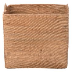 a large woven basket with handles on an isolated white background for use as a storage container or wall hanging