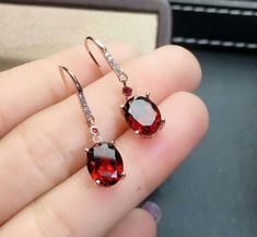 Welcome to Elegant Art Jewelry!  Stone: Natural Red Garnet Stone Size: ( Pendent: 8mm×10mm ), ( Ring: 8mm*10mm ), ( Earrings: 7mm*9mm ) Side Stone: Zircon Metal: 925 Sterling Silver Personalization: 9K/14K/24K/GOLD/SILVER/PLATINUM/ROSE-GOLD/WHITE GOLD. (Contact me)  Red Garnet Pendant, Red Garnet Cuff Pendant, 925 Sterling Silver Pendant, Oval Shape Pendant, Red Garnet Pendant, Red Garnet Engagement, Open Design Pendant, Red Garnet Oval, Emerald Red Garnet, Red Garnet, Red Gemstone, Gemstone Pen Garnet Jewelry Set, Red Garnet Jewelry, Red Garnet Necklace, Choker Necklace Designs, Necklace Luxury, Platinum Rose Gold, Garnet Red, Garnet Pendant, Garnet Necklace