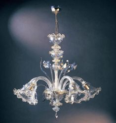 a crystal chandelier hanging from the ceiling