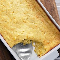 a casserole dish with a spoon in it