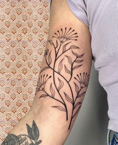 a person with a tattoo on their arm