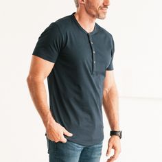 Description Details Care Fit This Essential Curved Hem Batch Henley is casual style for you to consider. Made from buttery soft 100% cotton jersey, it's comfortable on its own or easily layered. A narrow front placket plus curved hem make it perfect for your modern needs. It's a great alternative to a basic tee. see more outfitting ideas here > • Comfortable collar and placket• Durable faux horn buttons• Buttery soft lightweight 100% cotton jersey• Pre-washed/pre-shrunk fabric for soft hand and Banded Collar Shirts, Casual Long Sleeve Shirts, Basic Tee, Soft Hand, Pullover Sweatshirts, Favorite Shirts, Collar Shirts, Men Short Sleeve, Cool Shirts