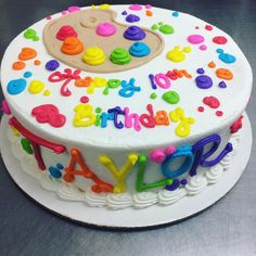 a decorated birthday cake with the words happy birthday love on it's bottom layer