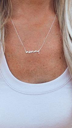 "A personalized mommy necklace that can be made in sterling silver, gold or rose gold. If you would like a different word or name we can make any word or name you would like! We also show an example of the necklace made with \"mama\" but again we can do any word or name. DETAILS Metal: Solid sterling silver, gold or rose gold options Width: 1.25\" Chain: 16\", 18\", or 20\" chain PERSONALIZATION If you would like a different word or name please write the word/name you would like in the personali Custom Name Necklaces For Mother's Day, Custom Name Necklaces For Everyday & Mother's Day, Custom Name Charm Necklaces For Mother's Day, Everyday Dainty Name Necklace For Mother's Day, Silver Minimalist Name Necklace For Mom, Silver Minimalist Name Necklace As Gift For Mom, Personalized Sterling Silver Name Necklace, Personalized Sterling Silver Meaningful Name Necklace, Customizable Sterling Silver Charm Necklace For Mother's Day