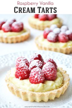 raspberry and vanilla cream tarts on a white plate with text overlay