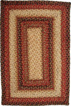 a square rug is shown in red, beige and black colors on a white wall