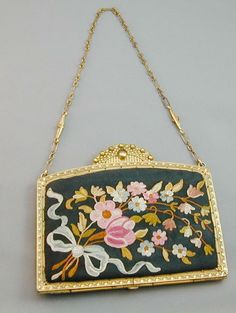 Early Embroidered Purse Silk Jeweled Frame SPECTACULAR Must See Early Embroidered Purse Silk Jeweled Frame SPECTACULAR Must See Description Up for offer is this spectacular antique purse from a local estate - the black appears to be silk and maybe the embroidery too.  The body measures 5 5/8 by 4.75 inches.  The inside appears to be silk as well.  There is a chain inside that something was attached to - not sure if it was the pouch or something else.  The pouch has a ton of wear but overall the Antique Gold Embroidered Bags, Antique Embroidered Evening Bags, Vintage Rectangular Bags With Gold Embroidery, Victorian Style Gold Embroidered Bag, Victorian Embroidered Evening Bags, Traditional Handmade Bags For Vintage Events, Vintage Wedding Bags With Gold Embroidery, Elegant Rectangular Ceremonial Bag, Elegant Rectangular Ceremonial Bags