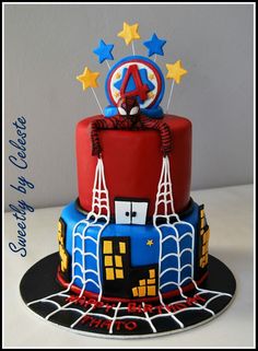 a spiderman themed birthday cake with stars and stripes on it's top tier