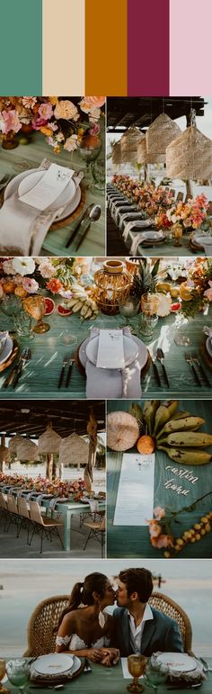 a couple kissing in front of a table full of food and plates with flowers on them