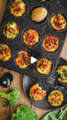 a muffin tin filled with mini pizzas next to broccoli on a wooden table