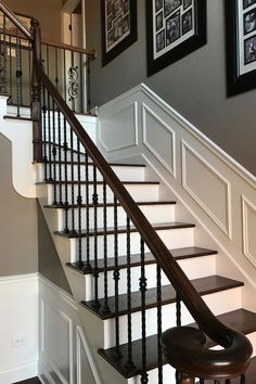 Looking to transform your staircase? Discover 63 amazing staircase makeover ideas that will elevate your home’s charm and functionality! From bold paint colors to stylish lighting, there are countless creative solutions to reinvigorate your space. Picture elegant handrails, chic stair runners, and stylish wall art that add personality and flair. Whether you prefer a modern look, a rustic feel, or something classically beautiful, there's inspiration for everyone. Don’t miss out on giving your home a refreshed look starting with your staircase! Wainscotting On Stairs, Wainscoting Ideas Staircase, Stair Wall Molding, Split Staircase Ideas, Dark Brown Stairs, Brown Staircase, Banister Ideas, Stair Paneling