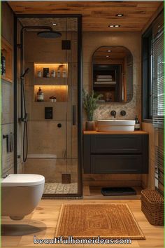 a bathroom with a toilet, sink and shower stall in the middle of the room