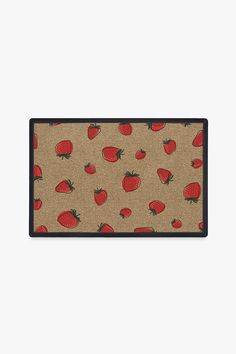 a door mat with strawberries on it