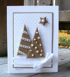 a handmade christmas card with two trees