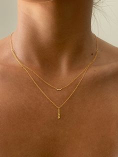 Elevate your style with this elegant gold double-layered necklace, crafted from high-quality 925 Sterling Silver. This piece features two delicate chains of varying lengths, creating a sophisticated layered look.• Material: 18K gold plated on solid 925 sterling silver, AAAAA Cubic Zirconia• Size: 38cm and 45cm + 5cm Extender• Hypoallergenic, lead and nickel-free• can wear in the shower Elegant Necklace Layering, Double Necklace Gold, Silver Necklace Layered, Layered Gold Necklace, Dainty Necklace Layered, Earring Stack, Prom Necklaces, Double Chain Necklace