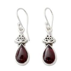 Garnet is dazzling in its crimson splendor. Set in silver the gems grace ornate earrings from Neeru Goel. .925 Sterling silver Ornate Sterling Silver Teardrop Earrings For Gift, Ornate Sterling Silver Teardrop Earrings As Gift, Sterling Silver Dangle Jewelry With Intricate Design, Elegant 925 Stamped Dangle Jewelry, Elegant Garnet Drop Earrings, Elegant Stamped 925 Dangle Jewelry, Silver Sterling Silver Teardrop Earrings, Elegant Sterling Silver Teardrop Earrings For Gift, Elegant Garnet Gemstone Earrings