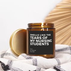 "The perfect, funny gift for your favorite nursing instructor, teacher, preceptor, clinical supervisor, or anyone involved in your nursing education!  ITEM DETAILS: This Amber Jar Candle is made with a coconut soy wax that is a vegan blend, gluten-free, toxin-free, paraben-free, and phthalate-free, and comes from renewable sources. Available scents include: Beachwood, Blackberry Vanilla, Blood Orange, Cinnamon Chai, Evergreen, Sage & Cypress, and Wild Fig. Specifications:  Jar Color: Amber Lid Color: Gold Wax Color: Natural (No Dyes) Wick Material: Cotton (Lead and Zinc free) Wax Material: Hand-Poured Coconut Soy Wax Made in the USA Size: 9 oz.; 2.8\" (W) x 3.5\" (H with lid) Burn Time : 50 Hours Hand Poured in the USA ABOUT US:  Welcome to Space Coast Market--thank you for shopping with u Thank You Gift For My Realtor, Gifts For Realtors Thank You, Gift For Realtor At Closing Thank You, Realtor Gifts For Agents, Realtor Giveaways, Gifts For Realtors, Clinical Instructor, Realtor Ideas, Nursing Instructor