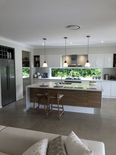 the kitchen is clean and ready to be used as a living room or dining area