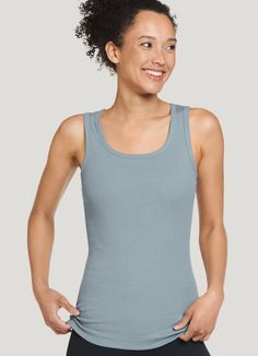 Jockey® 100% Cotton Rib Tank | Jockey.com Soft Cotton Tops, Basic Cotton Tank Top For Yoga, Basic Cotton Yoga Tank Top, Seamless Cotton Tops For Relaxation, Cotton Seamless Tops For Relaxation, Relaxed Fit Soft Cotton Tops, Fitted Cotton Activewear For Relaxation, Comfortable Seamless Cotton Tops, Comfortable Stretch Tank Top