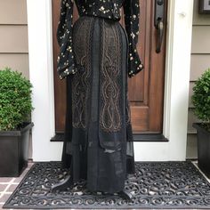 "Antique Silk Crepe Skirt, Mourning Clothing Late 1800s. early 1900s ja 9101913 Antique silk crepe black skirt from late 1800s, early 1900s. Gorgeous bronze silk thread embroidered (brocade) design down the front, very elegant. Hook and eye closure in back, floor length, sheer light silk crepe fabric, so a petticoat or long slip underneath is needed. * Blouse shown in photo is available for purchase in the shop. Measures; 28\" waist, 37\" length (over the ankle). Antique condition, some smaller Black Lined Maxi Skirt For Daywear, Black Maxi Skirt For Daywear, Embroidered Black Evening Skirt, Black Embroidered Evening Skirt, Embroidered Black Skirt For Evening, Vintage Black Mini Skirt, Silk Crepe Fabric, Crepe Skirt, Light Silk