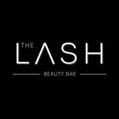 the logo for the beauty bar, the lasheshade is black and white with silver lettering