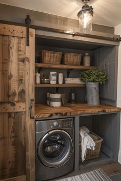 a washer and dryer in a room next to a wooden shelf with baskets on it