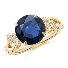 an oval blue sapphire and diamond ring in yellow gold