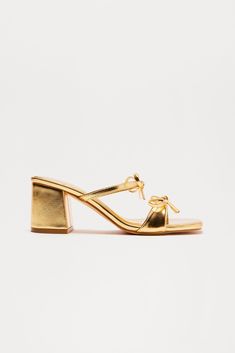 Available In Black And Gold. Heeled Mules Square Toe Bow Detail Block Heel Imported | Maribelle Bow Heeled Mules Heel Shoes in Gold size 6.5 by Fashion Nova Sweater Jumpsuit, Bow Heels, Black Friday Deals, Gold Fashion, Matching Dresses, Heel Shoes, Bow Detail, Black And Gold, Heeled Mules