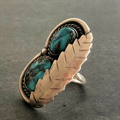 "VINTAGE NAVAJO RING DESCRIPTION: Two breathtaking specimens of high blue Morenci turquoise, this ring will be a treasured addition to your collection of fine vintage Native American jewelry. MEASUREMENTS: Ring face measures 1 5/8\" x 1\" RING SIZE: 7 1/4 WEIGHT: 14.9 grams SIGNED: no STERLING: unmarked, verified sterling silver" Southwestern Style Blue Nickel-free Rings, Bohemian Turquoise Ring With Inlay For Anniversary, Bohemian Turquoise Inlay Ring For Anniversary, Antique Blue Turquoise Ring For Anniversary, Artisan Rings With Patina For Collectors, Bohemian Jewelry With Patina For Anniversary, Bohemian Blue Collectible Ring, Antique Turquoise Adjustable Rings, Vintage Blue Turquoise Ring For Anniversary