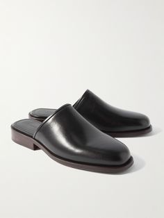 LEMAIRE builds its minimal collections from only the finest materials. These mules are constructed from a single piece of leather, expertly moulded to achieve the sleek square toe. Rubber inserts complete the low stacked heels. Mules For Men, Jeweled Bag, Leather Slippers, The Low, Leather Mules, Mr Porter, Stacked Heel, Single Piece, Summer Shoes