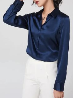 Elevate your wardrobe with our Elegant Women's Long-Sleeved 100% Silk Blouse, expertly crafted from luxurious mulberry silk. This blouse features a regular fit and a flattering V-neck design, making it a versatile addition to any outfit. The slight stretch in the fabric provides comfort while maintaining a refined silhouette, perfect for both professional and casual settings. With full-length sleeves and a slim clothing pattern, this blouse combines sophistication with practicality. The single-b Leggings And Socks, Pre Fall Collection, Summer Clearance, Tee Dress, Clothes Collection, Mulberry Silk, Elegant Woman, Silk Blouse, Clothing Patterns