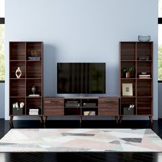 a living room with a large entertainment center