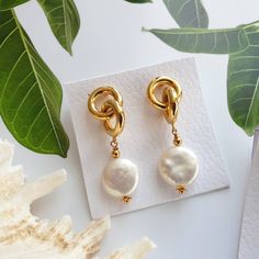 Coin pearl earrings, Baroque pearl earrings, White pearl earrings, Link chain earrings, Modern earrings, Real pearl earrings, Long bridal earrings, bridesmaid earrings, mothers day gift, pearl drop earrings, gold hoop earrings, freshwater pearl earrings DESCRIPTION Pearls have evolved into one of the most popular trends that started in 2020 and they're going to maintain their place among the trends for year 2021. The listing is for a one pair of earrings. You can choose from three styles: 1 styl Baroque Pearl Jewelry, Baroque Pearls Jewelry, Coin Pearl Earrings, Long Bridal Earrings, Real Pearl Earrings, Pearl Drop Earrings Gold, Earrings Real, Popular Trends, Earrings Gold Hoop