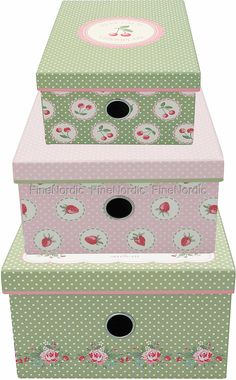 three boxes are stacked on top of each other with polka dots and strawberrys painted on them