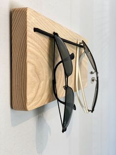 Sunglasses holder is a carefully handcrafted and useful item that will help you to cheer up your home.  Installation is very easy. No screws is visibl after mounting. Sunglasses holder was designed to  organize your space smartly. It allows to store your sunglasses safely and minimaze chance for scraching. Sunglasses Display Diy, Eye Glasses Holder, Staging Decor, Entryway Organizer, Sunglasses Display, Sunglasses Holder, Entryway Organization, Sunglass Holder, Christmas Deals