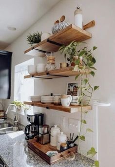 the kitchen counter is clean and ready to be used as a coffee bar or breakfast bar