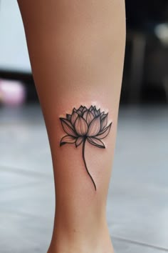 Lotus flower tattoo on a person's calf. Unique Lotus Flower Tattoo, Meaning Of Lotus Flower, Tiny Lotus Tattoo, Ring Finger Tattoo, Lotus Flower Meaning, Lotus Artwork