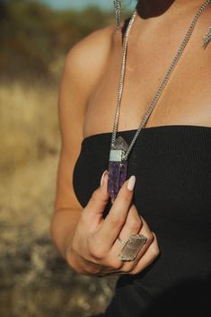 "This large Amethyst crystal necklace is the one you've been dreaming of. It's a statement necklace like no other with it's beautiful double-terminated Amethyst gemstone and silver curb chain! Amethyst, known as the Stone of Spiritual Wisdom, is believed to enhance intuition, calm the mind, and foster a sense of inner peace. Wearing this beauty not only elevates your style but invites the harmonizing influence of Amethyst into your daily life.  ▲ Double-terminated Amethyst gemstone pendant approximately 3\" in length x .75\" in width ▲ Silver curb chain 4 x 5mm ▲ Handmade in Arizona Also available in gold | model wears 24\" necklace. Please use sizing guide below to confirm the length you need.  Want to see more crystal necklaces? https://etsy.me/3hPv5EZ ✦ S I Z I N G ✦ Length is the open Purple Spiritual Necklace With Large Pendant, Spiritual Purple Necklace With Large Pendant, Spiritual Purple Pendant Jewelry, Spiritual Purple Jewelry With Large Pendant, Mineral Crystal Amulet Pendant Jewelry, Spiritual Purple Pendant Necklace, Amethyst Necklace With Large Pendant For Healing, Healing Pendant Jewelry With Large Stone, Amethyst Crystal Necklace For Healing