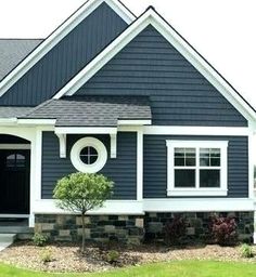 a house with blue siding and white trim